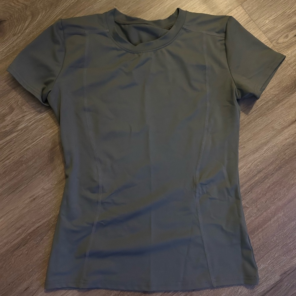 Worn once, tight fit, running shirt